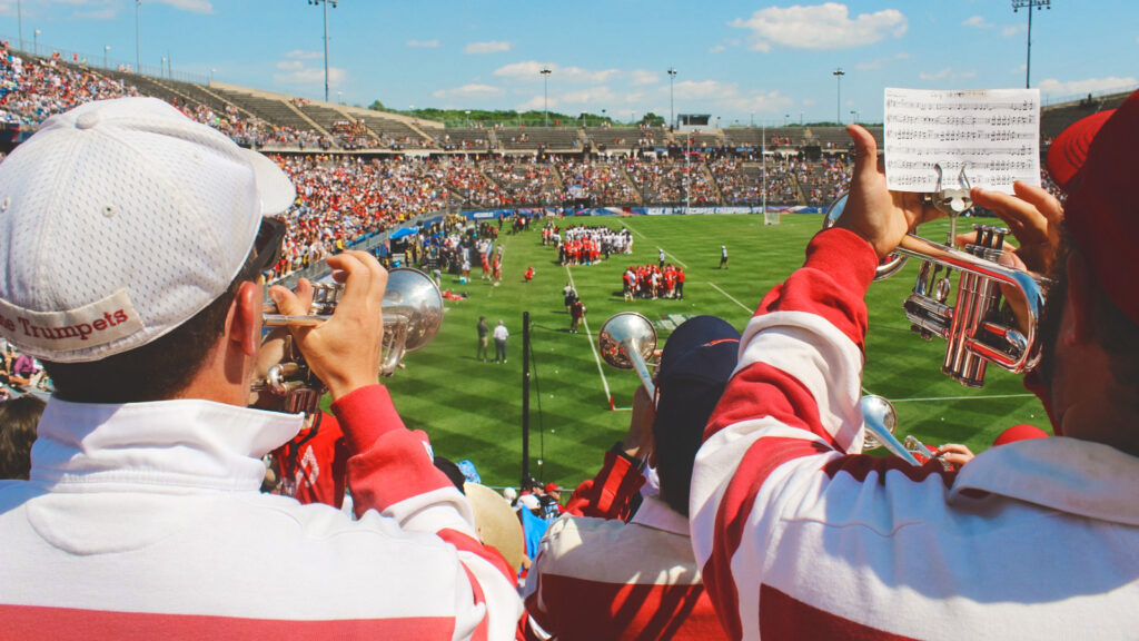 Big Red Pep Band members play in the stadium during the NCAA men's lacrosse tournament final in May 2022 in East Hartford, CT