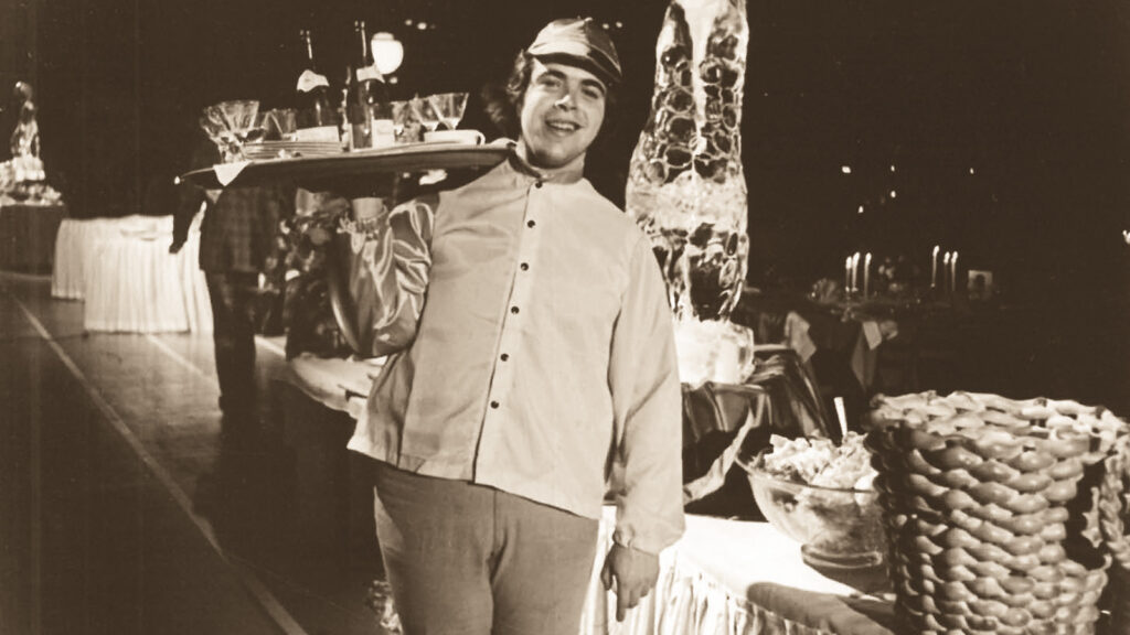 Drew Nieporent as a waiter at Hotel Ezra Cornell