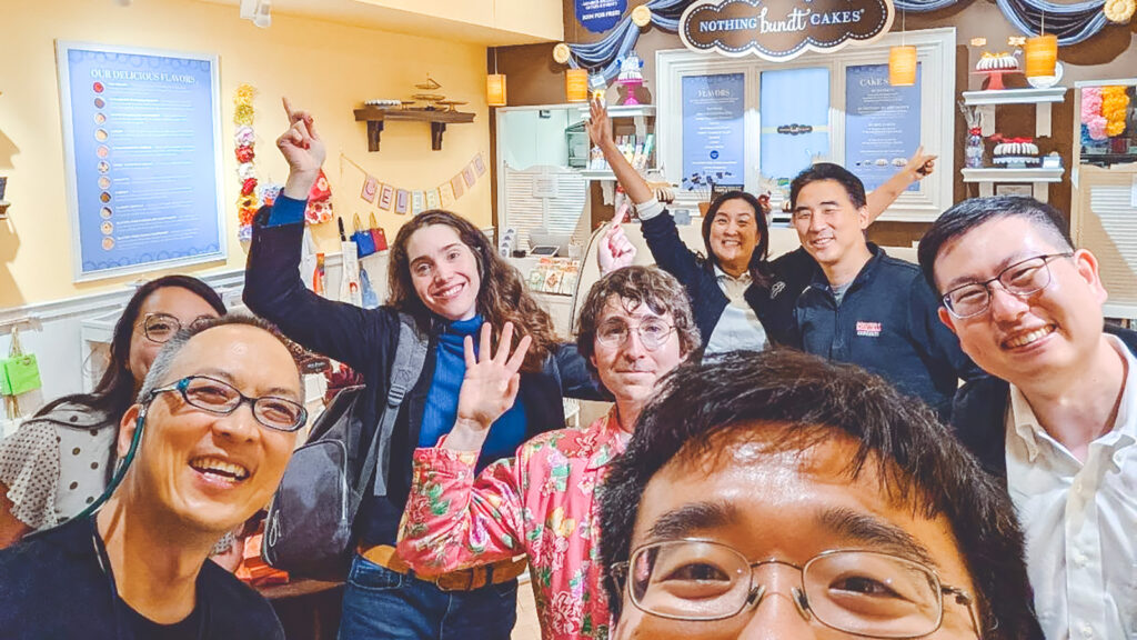 Tony Chen with alumni at a bakery during a California trip
