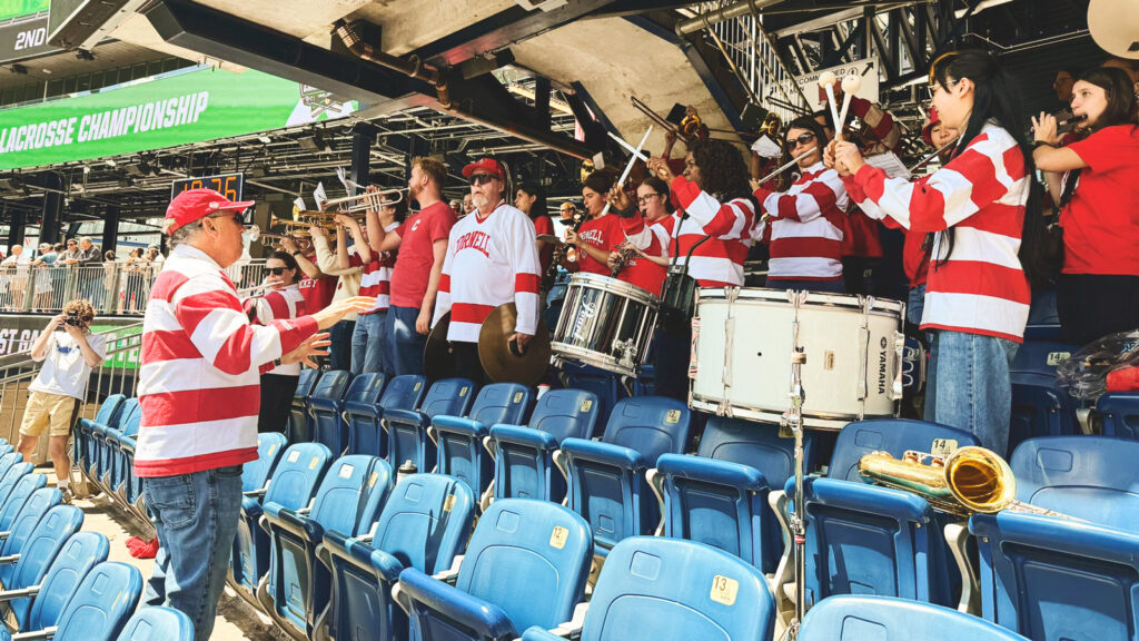 Pep Band members, including alumni, play in the stadium in Foxborough, Massachusetts, at the men's NCAA lacrosse championships in early 2025