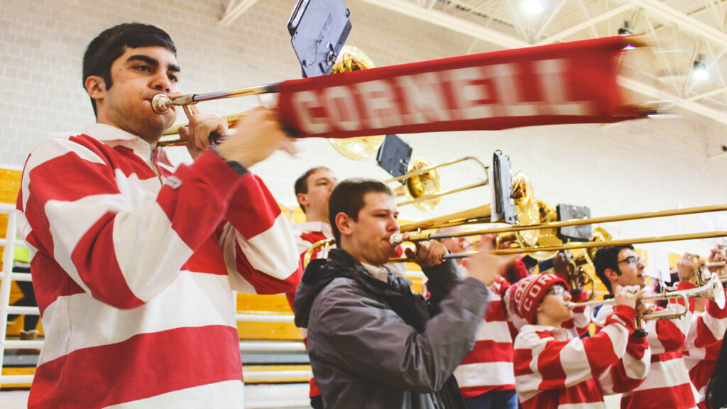 Pep Band members, with trombonists in the foreground, play during a January 2019 basketball game against Columbia