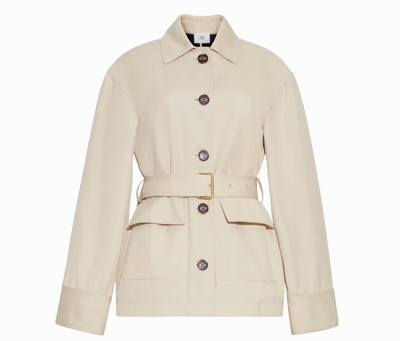 A woman's white jacket with large buttons and a belt