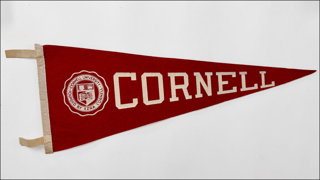 vintage red Cornell pennant on a white background
