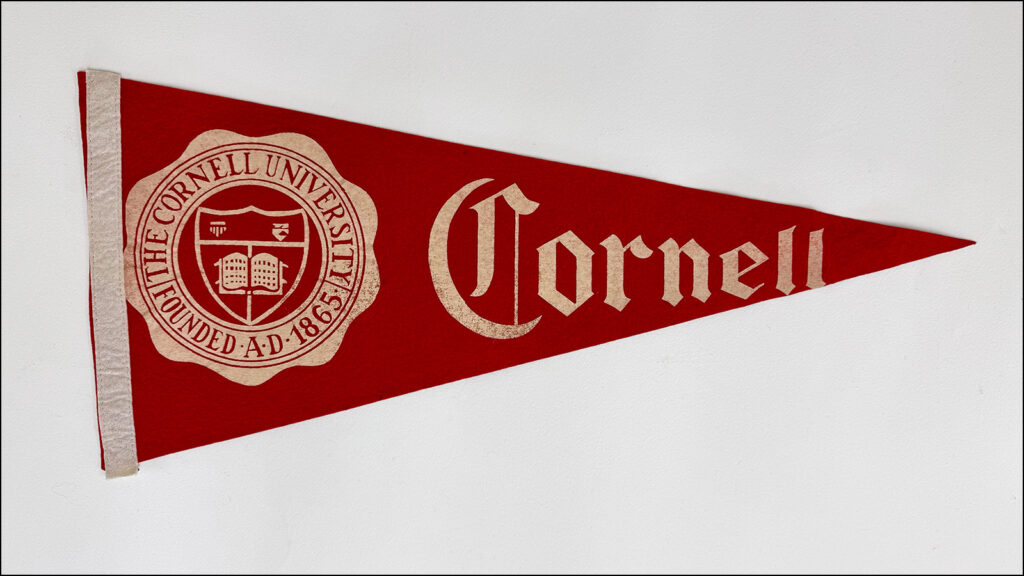 vintage red Cornell pennant on a white background