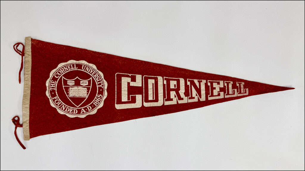 vintage red Cornell pennant on a white background