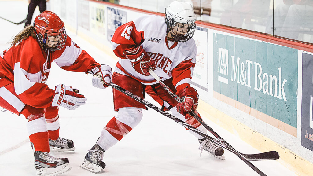 Jillian Saulnier plays hockey against BU