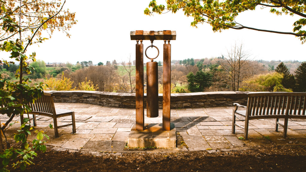the bell, created from a steel acetylene tank cylinder, at Newman Overlook above the Arboretum at the Cornell Botanic Gardens