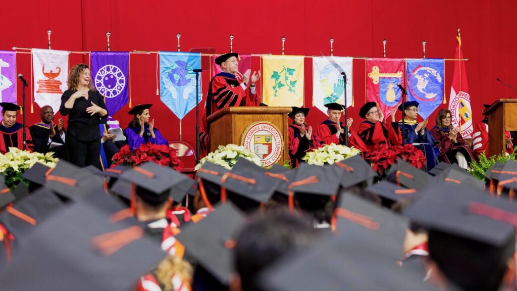 President Mike Kotlikoff applauds the graduating students at the December 2025 recognition ceremony in Barton Hall