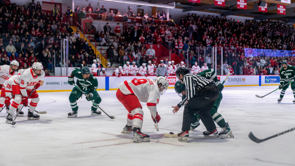 Players crouched for the face-off at the start of the game against Dartmouth.