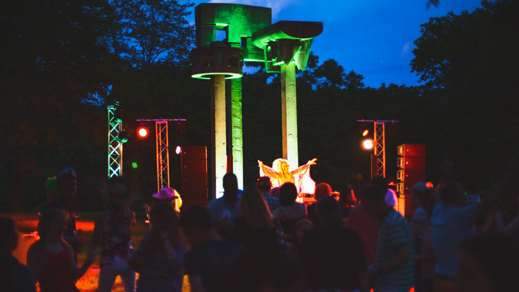 A dance party at Reunion 2017 held at the sculpture garden at the Botanic Gardens