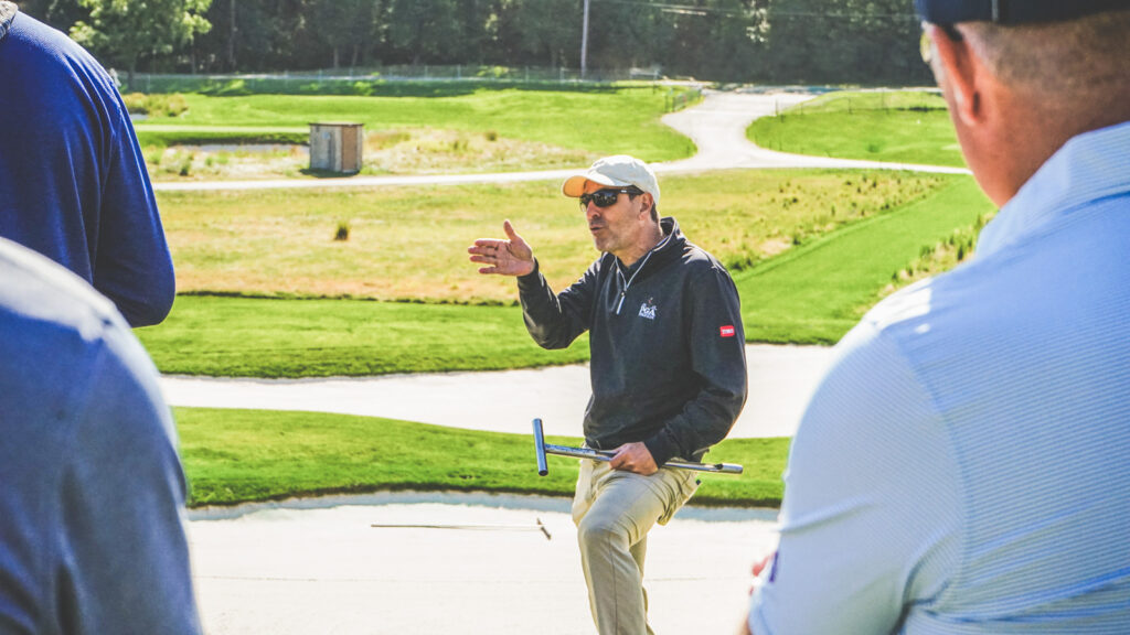 Frank Rossi, associate professor of horticulture in the College of Agriculture and Life Sciences, leads Long Island golf course superintendents on a walk-and-talk event at Bethpage, just weeks before the 2025 Ryder Cup.