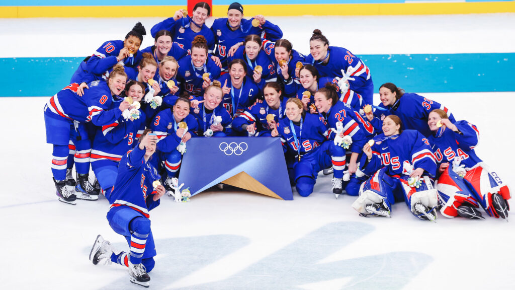 MILAN, ITALY - FEBRUARY 19: Megan Keller #5 of Team United States takes a victory selfie with her teammates after the medal ceremony for the Ice Hockey Women following the Women's Gold Medal match between the United States and Canada on day 13 of the Milano Cortina 2026 Winter Olympic games at Milano Santagiulia Ice Hockey Arena on February 19, 2026 in Milan, Italy. (Photo by Sarah Stier/Getty Images)