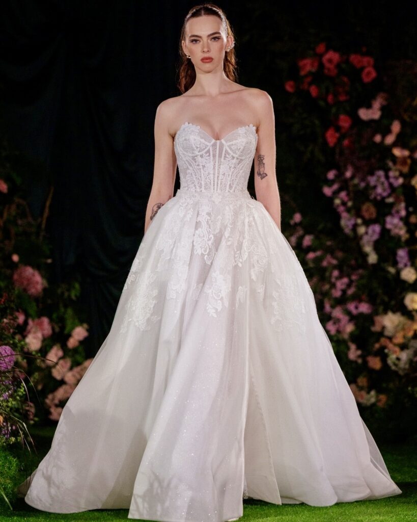 Model wearing the Hayley Paige "Becoming Jane" dress in ivory/cashmere