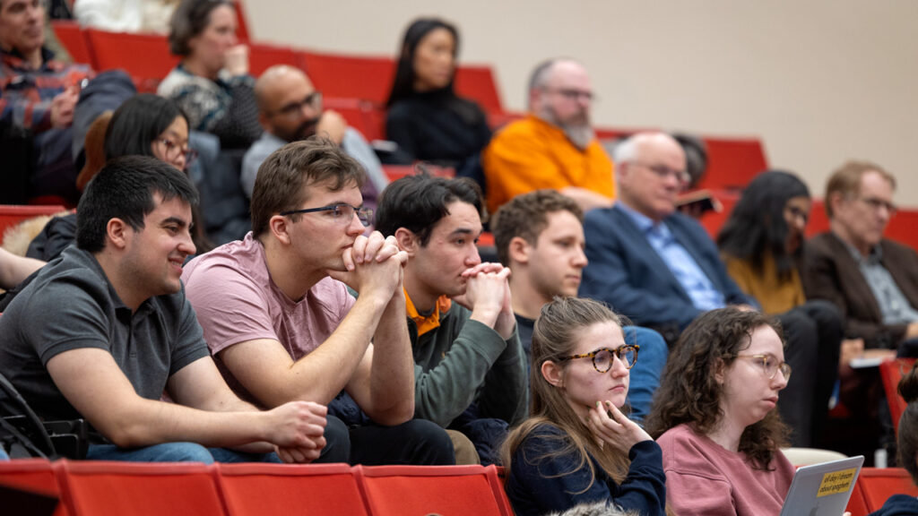 Students watch as New York Times columnist Ross Douthat debates Cornell professor of philosophy Kate Manne on the issue of declining fertility rates as part of the Disagreement class taught by Peter John Loewen, the Harold Tanner Dean of the College of Arts & Sciences and professor of government in Uris Hall on Wednesday, February 11, 2026. (Ryan Young / Cornell University)