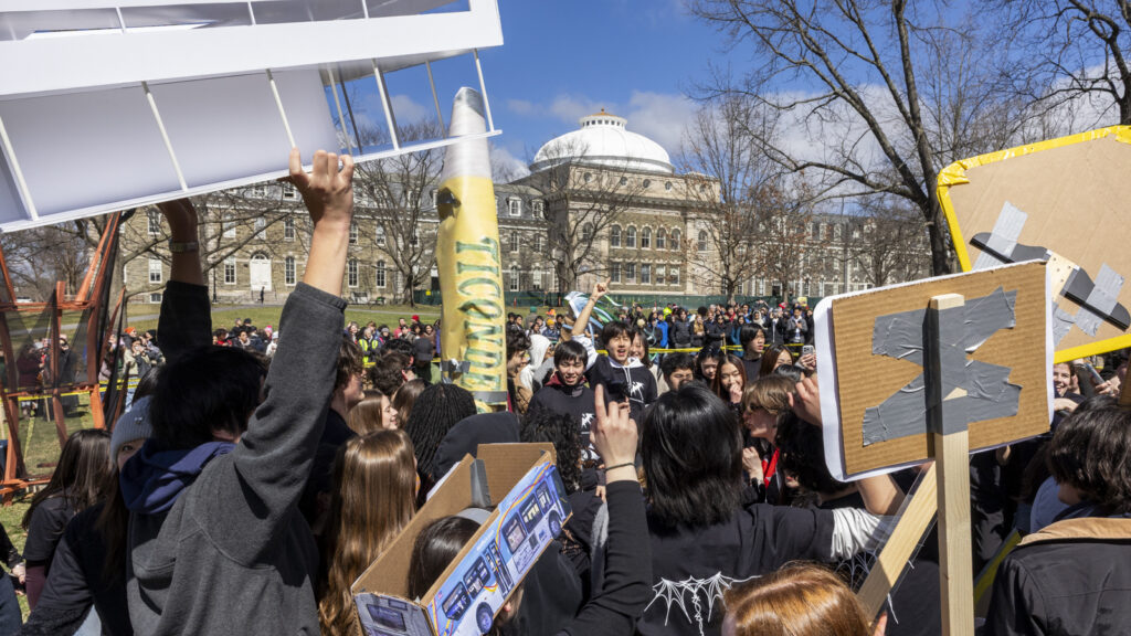 Hundreds of students in various costumes celebrate on the Arts Quad during Dragon Day 2026