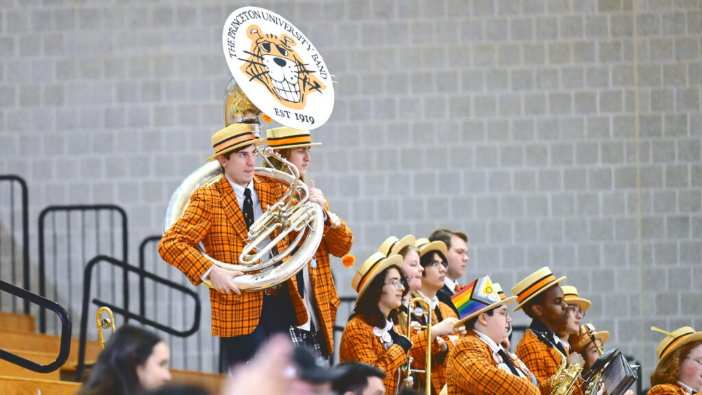 The Princeton band plays in orange plaid jackets