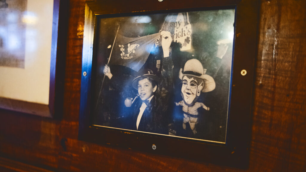 A photo of Justin McManus as a child at a neighborhood St. Patrick’s Day parade hangs in the bar's interior