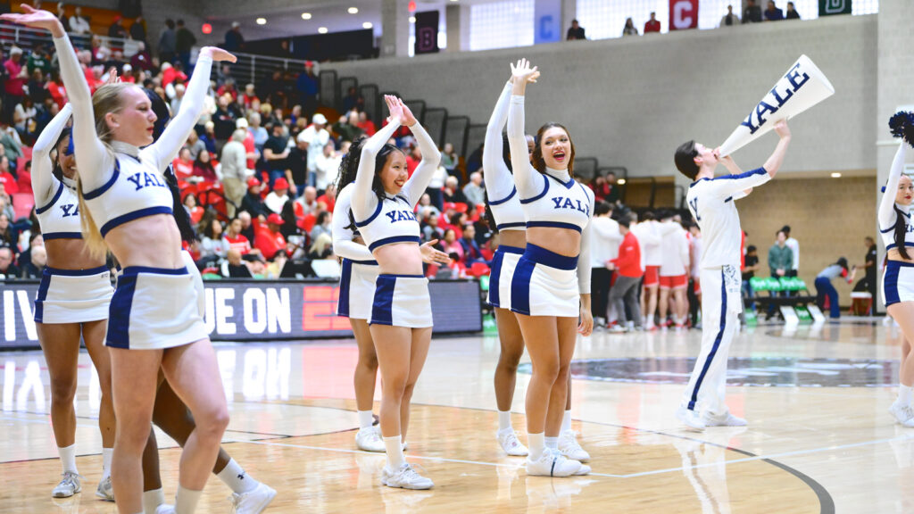 The Yale cheerleaders on the court