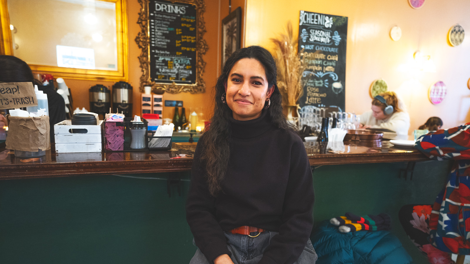 Mouleena Khan ’12 at the bar at Cheeni in Brooklyn