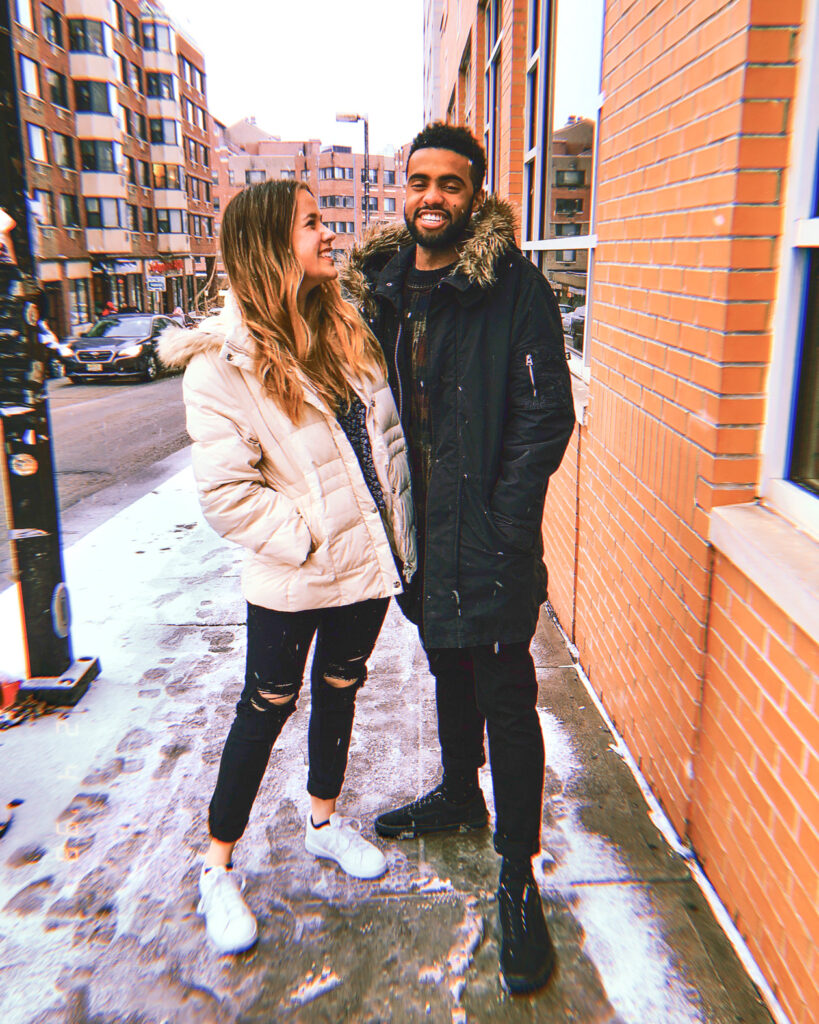 Meghan McKenzie Russell and Paul Russell as a students in Collegetown in the winter.