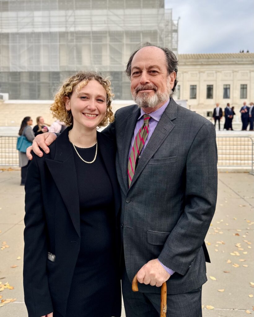 Victor Schwartz and his daughter, Chloë, standing outside the U.S. Supreme Court.
