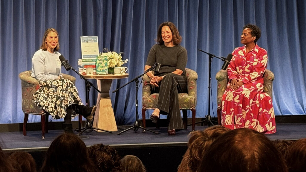 Alli Frank (center) and coauthor Asha Youmans (right) are interviewed onstage by a moderator