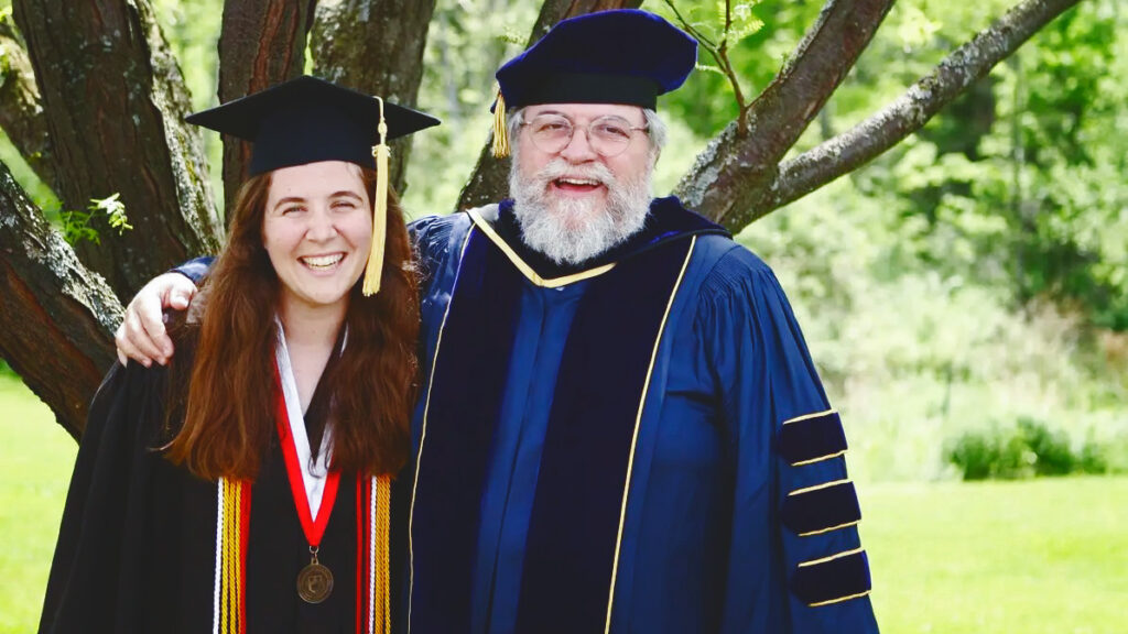 Katherine Bemis ’15 at her Cornell graduation with her dad, professor William Bemis ’76