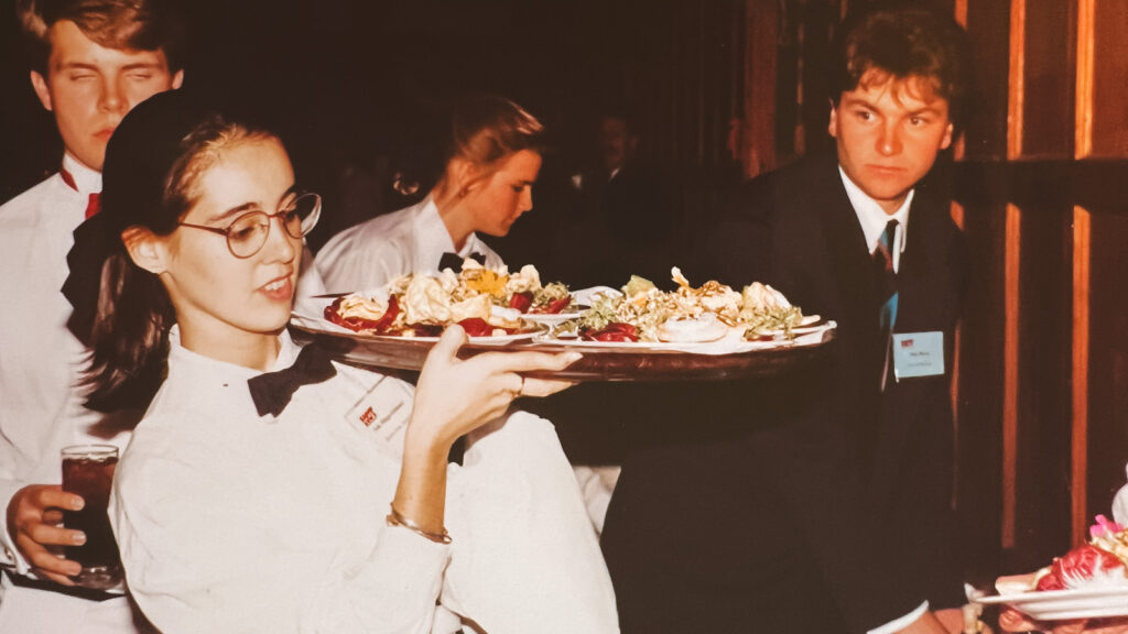 A student carries a tray during an event at Hotel Ezra Cornell in 1993