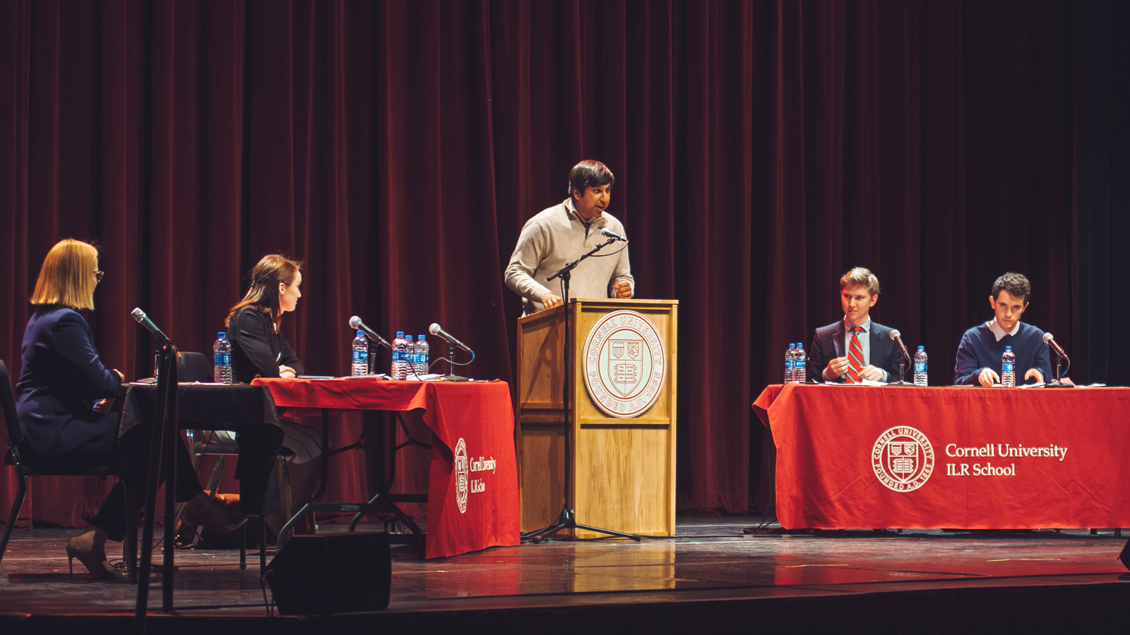 members of Cornell's Speech and Debate Program host a debate event at Ithaca's State Theatre in 2018