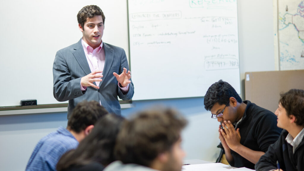 members of Cornell's Speech and Debate Program practice techniques in a classroom in 2012