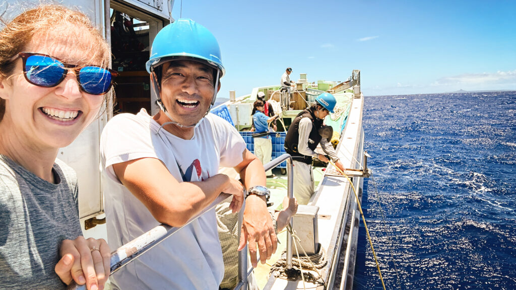 Katherine Bemis, left, and Atsushi Kaneko of the Okinawa Churaumi Aquarium are pictured at sea in 2025 during a survey of deep reef fishes off Okinawa, Japan