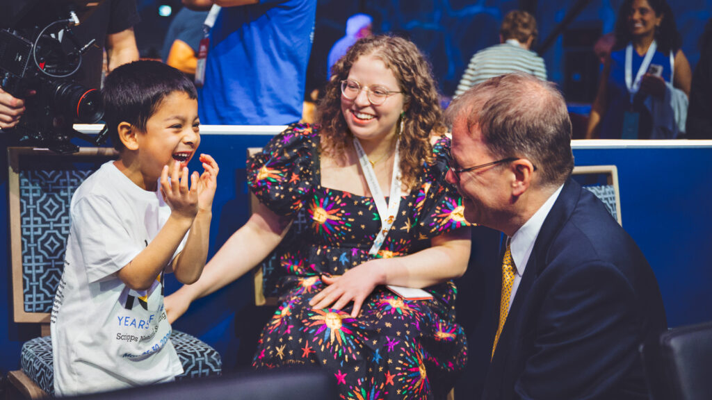 Jacques Bailly meets a young fan during the 2025 Scripps National Spelling Bee on May 29, 2025 in National Harbor, MD.