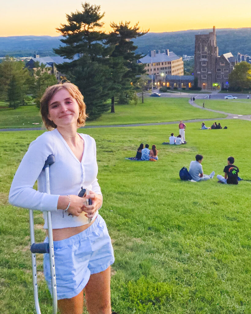 Camille Brady on the Slope leaning against a crutch