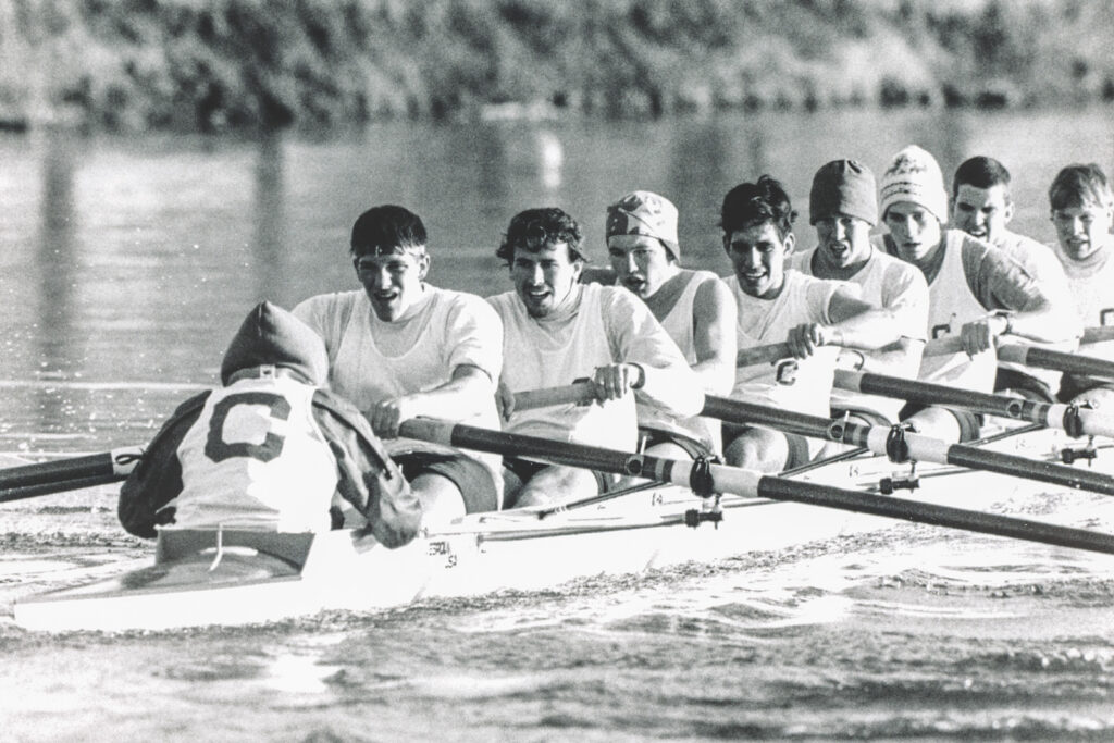A black and white photo of the 1989 team, including Kennett, in action rowing.