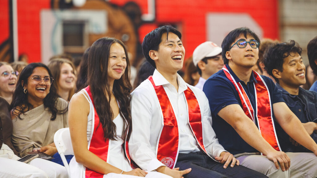 Students laugh during the Convocation speech
