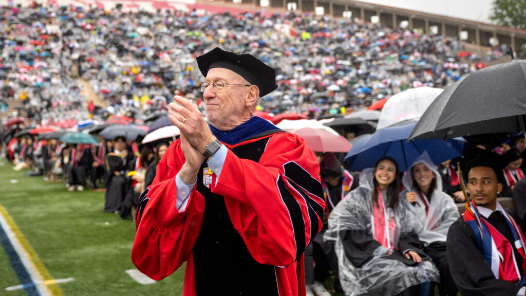 President Mike Kotlikoff claps in the stadium