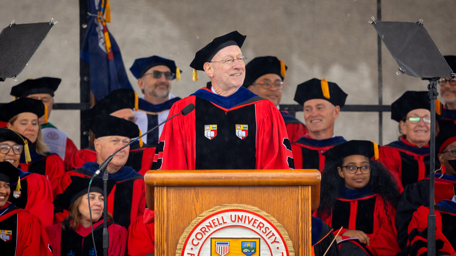 President Mike Kotlikoff delivering his address on the podium during Commencement
