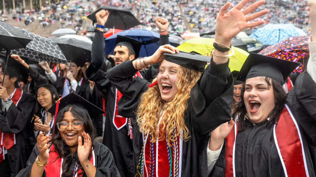 Several female grades wave and cheer