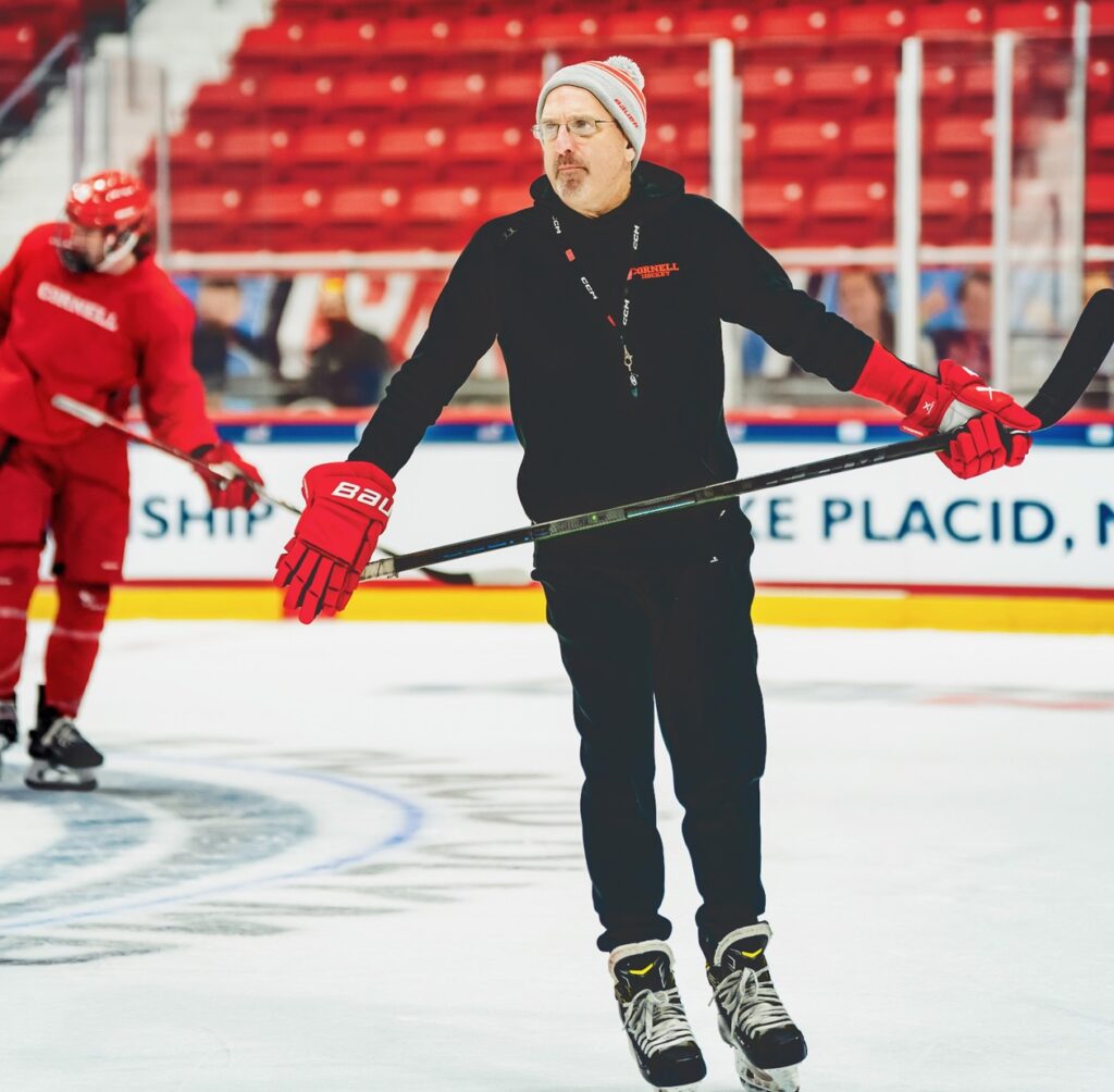 Casey Jones leads a practice on the ice in Lake Placid