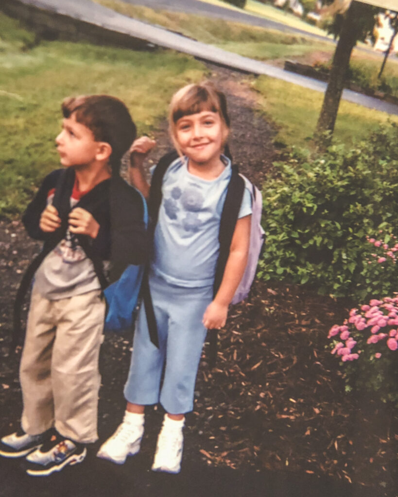 Lara Patz as a child with a young boy