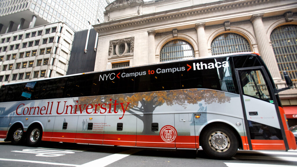 view of the Campus-to-Campus bus with its first wrap outside Grand Central Terminal in New York City