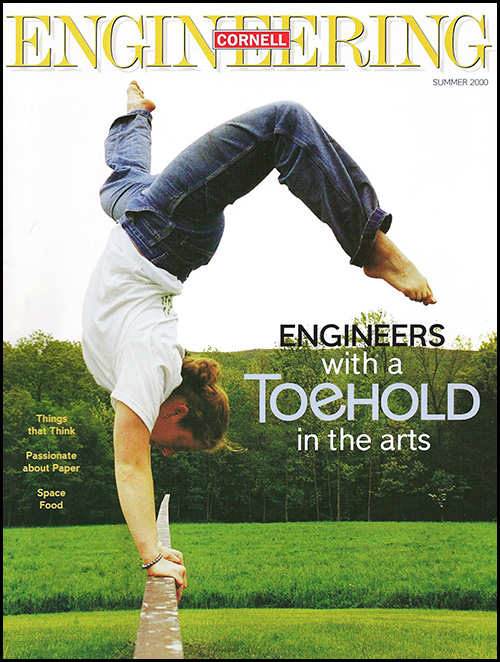 The cover of Cornell Engineering Magazine from 2000 featuring Alison Sheets-Singer upside down on the balance beam in front of a grass field.