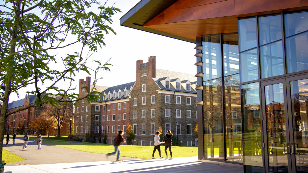 Students walk past Morrison Hall on North Campus, Cornell University