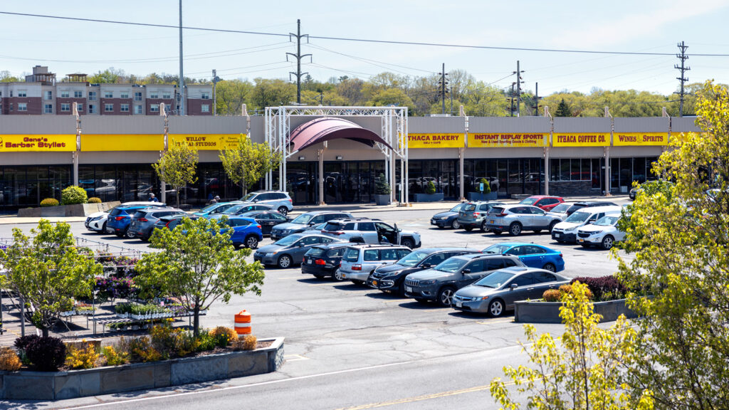 Triphammer Marketplace from the outside of the building, including the parking lot.