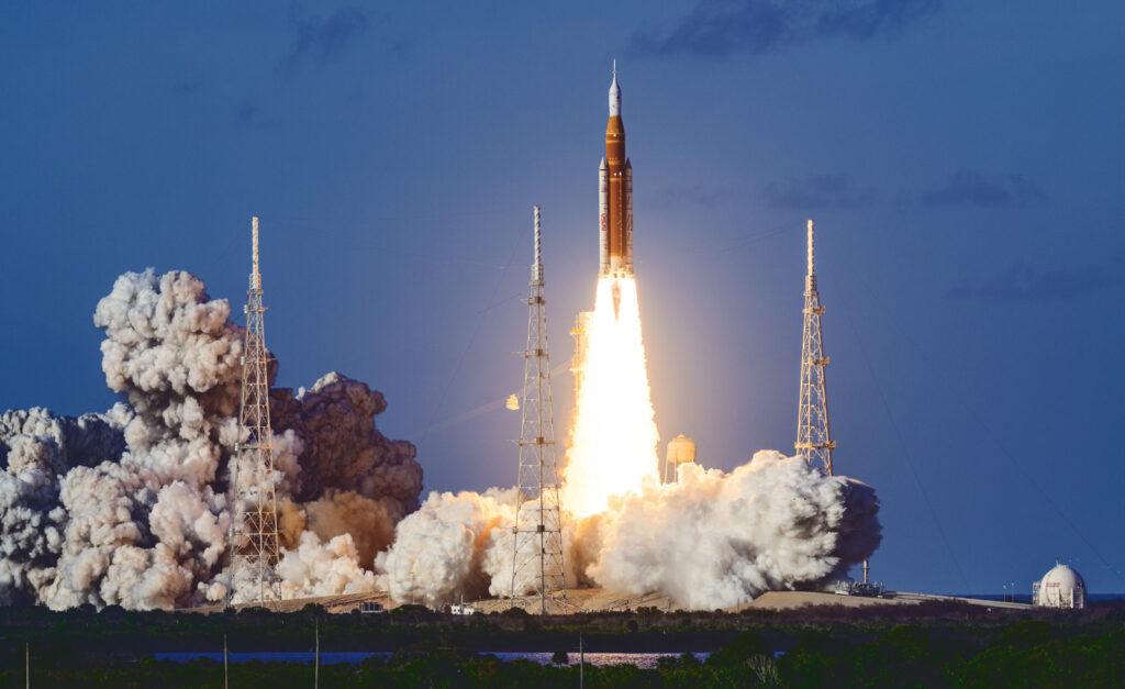 NASA’s Space Launch System rocket launches carrying the Orion spacecraft with NASA astronauts Reid Wiseman, commander; Victor Glover, pilot; Christina Koch, mission specialist; and CSA (Canadian Space Agency) astronaut Jeremy Hansen, mission specialist on NASA’s Artemis II mission, Wednesday, April 1, 2026, from Operations and Support Building II at NASA’s Kennedy Space Center in Florida. NASA’s Artemis II mission will take Wiseman, Glover, Koch, and Hansen on a 10-day journey around the Moon and back aboard SLS rocket and Orion spacecraft launched at 6:35pm EDT from Launch Complex 39B.