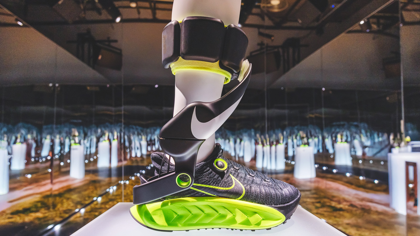 Project Amplify in a black and lime green color way on a mannequin leg.