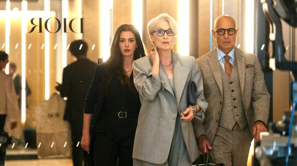 a still image from the movie "The Devil Wears Prada 2," with Anne Hathaway, Meryl Streep, and Stanley Tucci