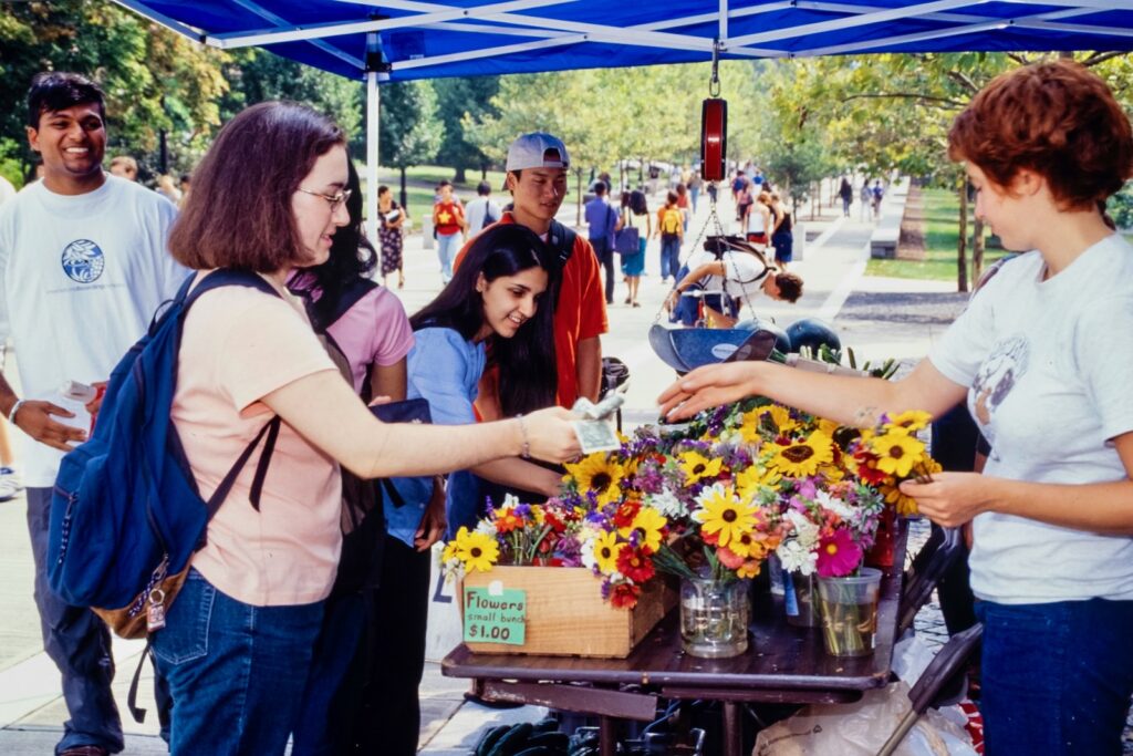 a flower sale is held on Ho Plaza on campus in 2001