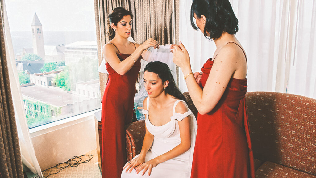 Nicole Neroulias Gupte ’01 in Statler Hotel getting ready for her wedding
