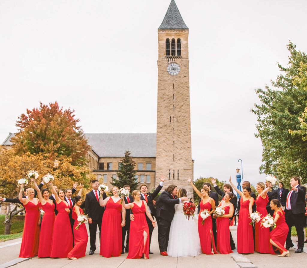 Erica Sylvan Lill ’11, BS ’10 & Lucas Lill ’10, BS ’11 and their bridal party outside McGraw Tower